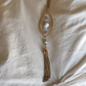 Long gold beaded necklace